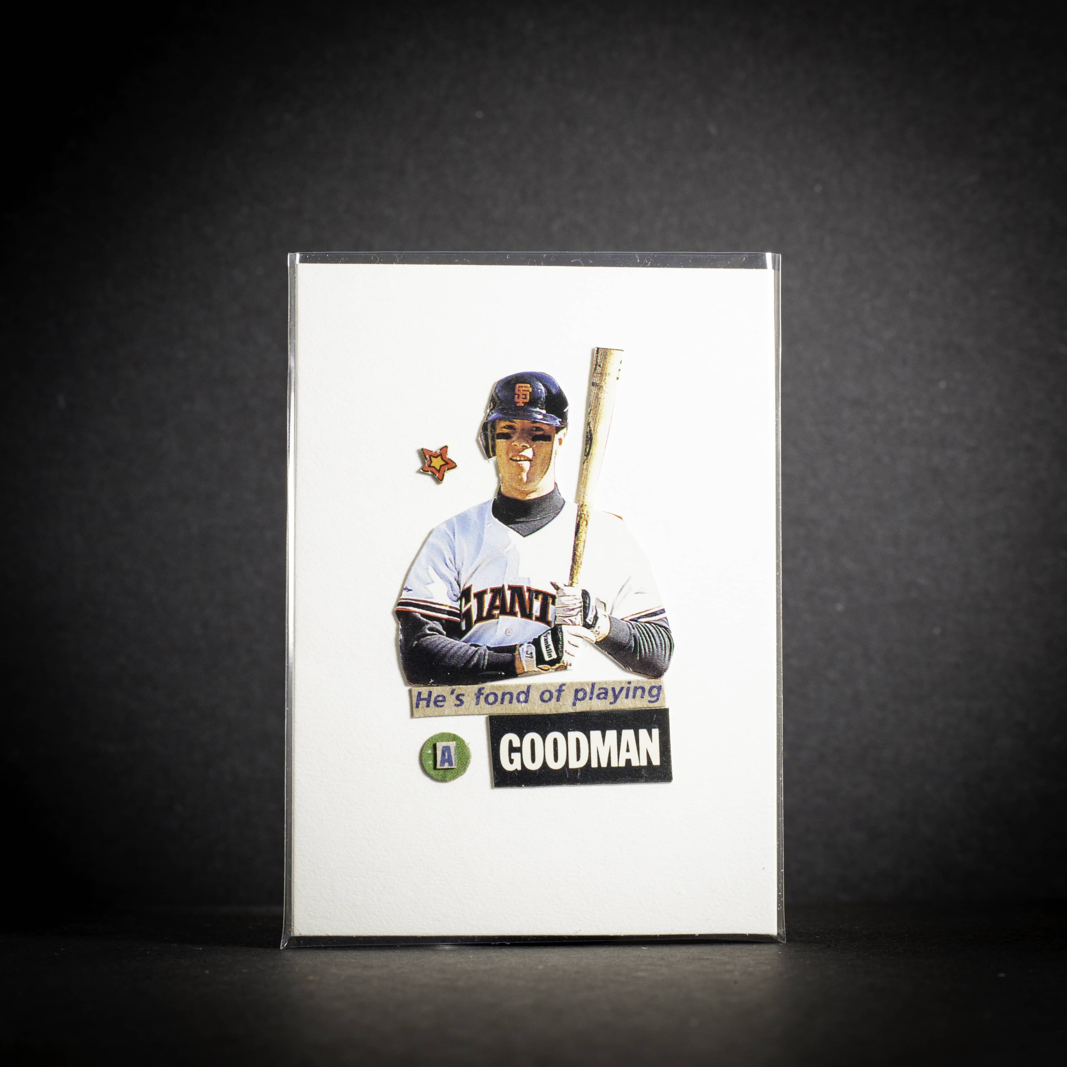 Baseball trading card of a player with a bat on a white background