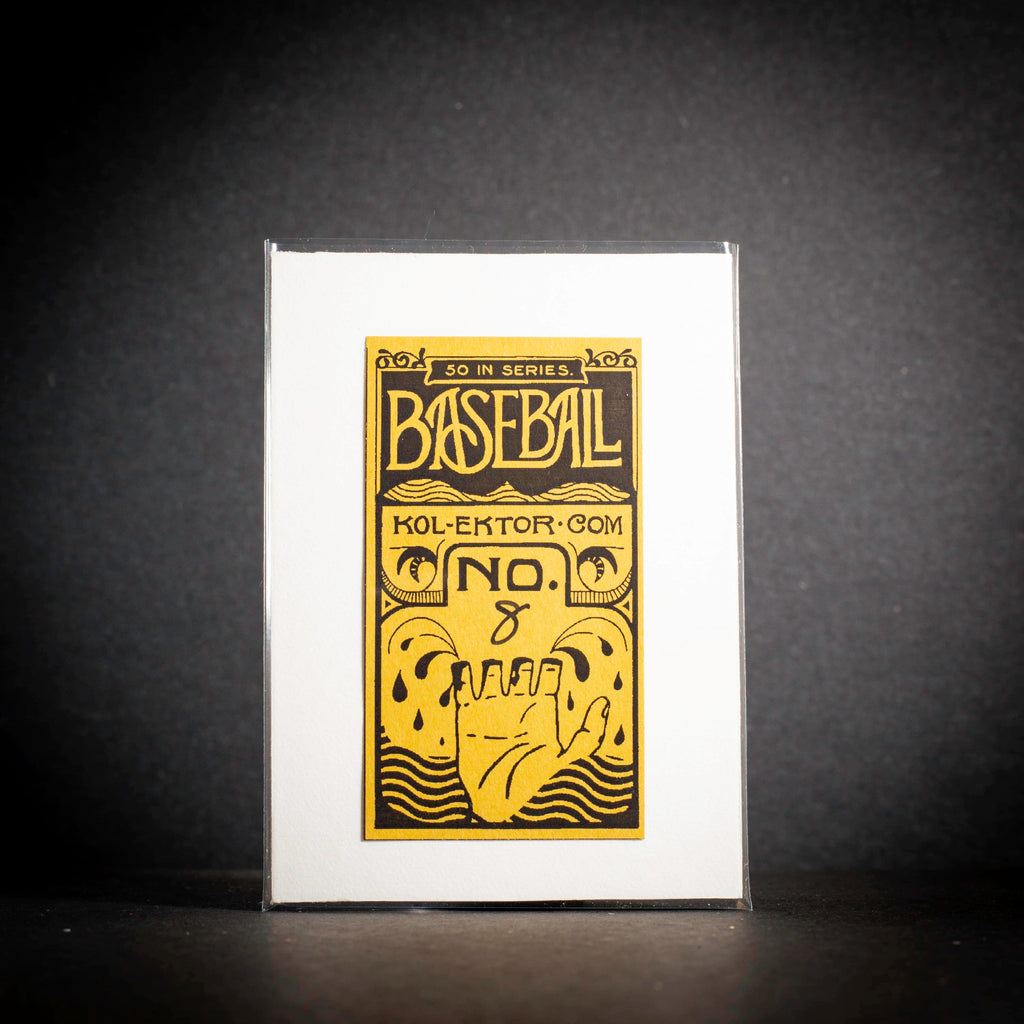 Baseball card packaging with yellow text and design on a black background
