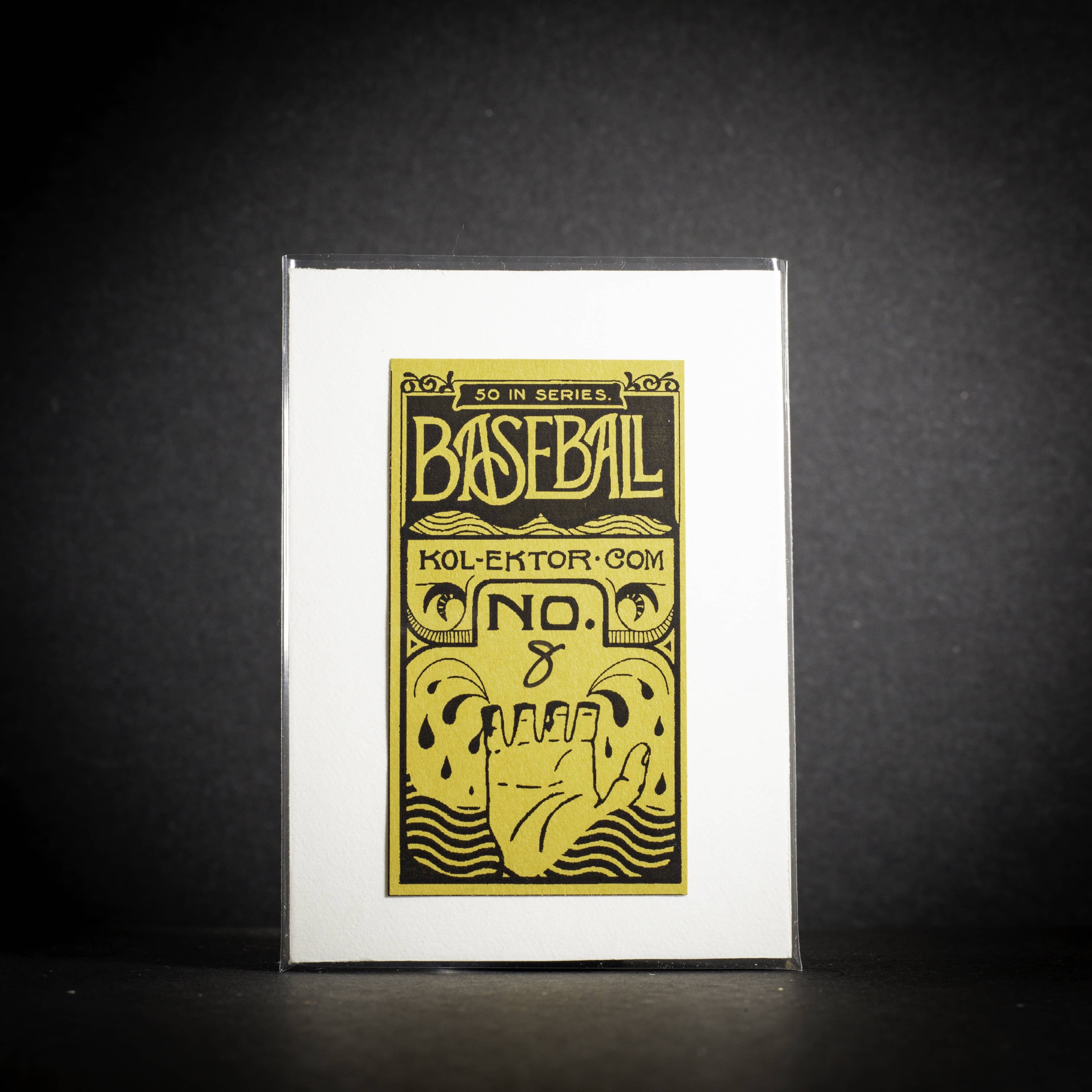 Baseball card packaging with yellow text and design on a black background