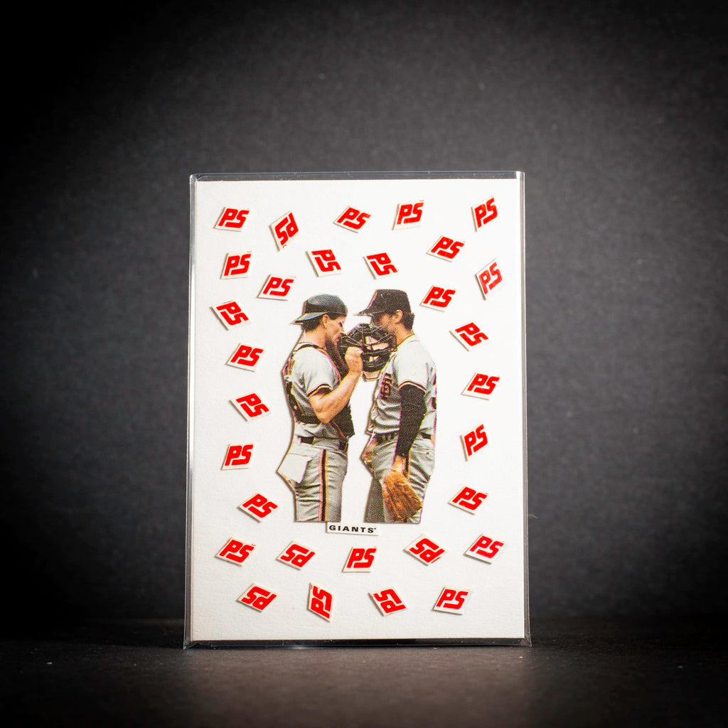 Baseball card with two players hugging on a white background with 'PS' logo pattern