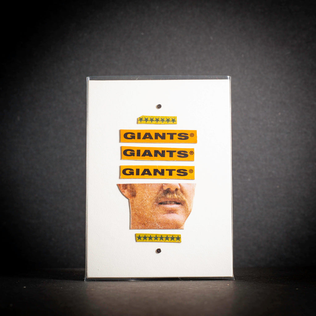 Product packaging with 'GIANTS' branding on a dark background