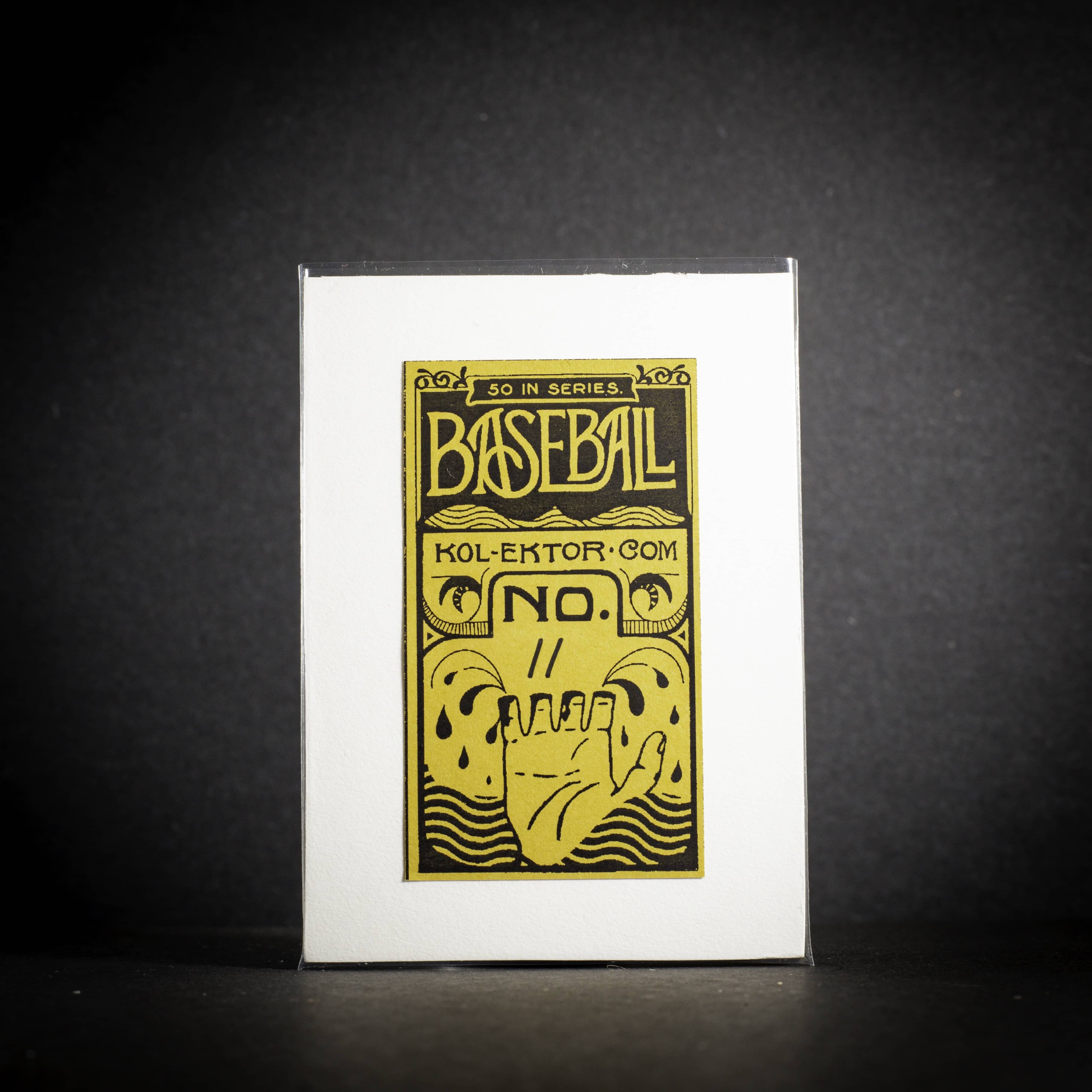 Baseball card with yellow text and design on a white card against a dark background