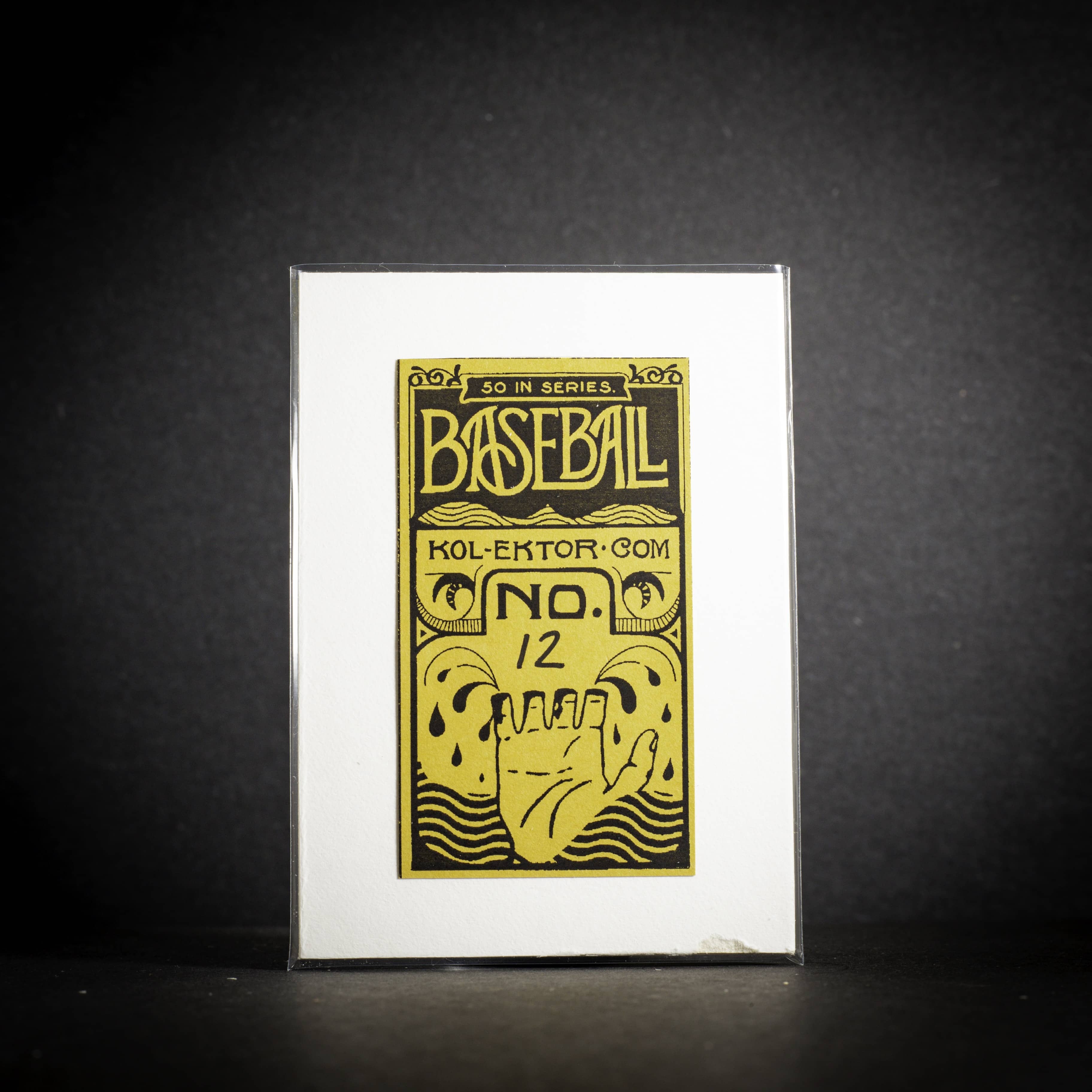 Baseball card packaging with yellow text and design on a black background