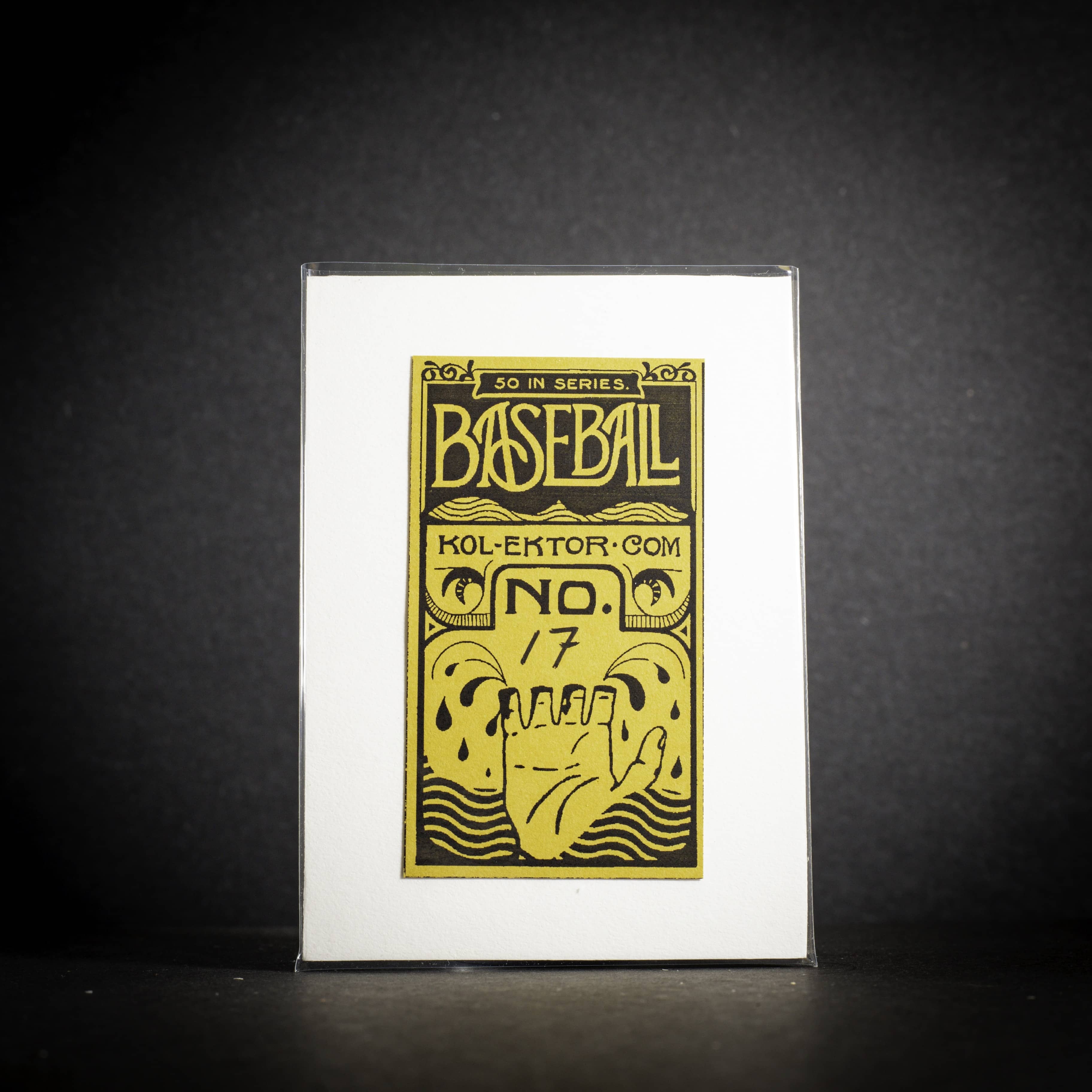 Baseball card with yellow text and design on a black background