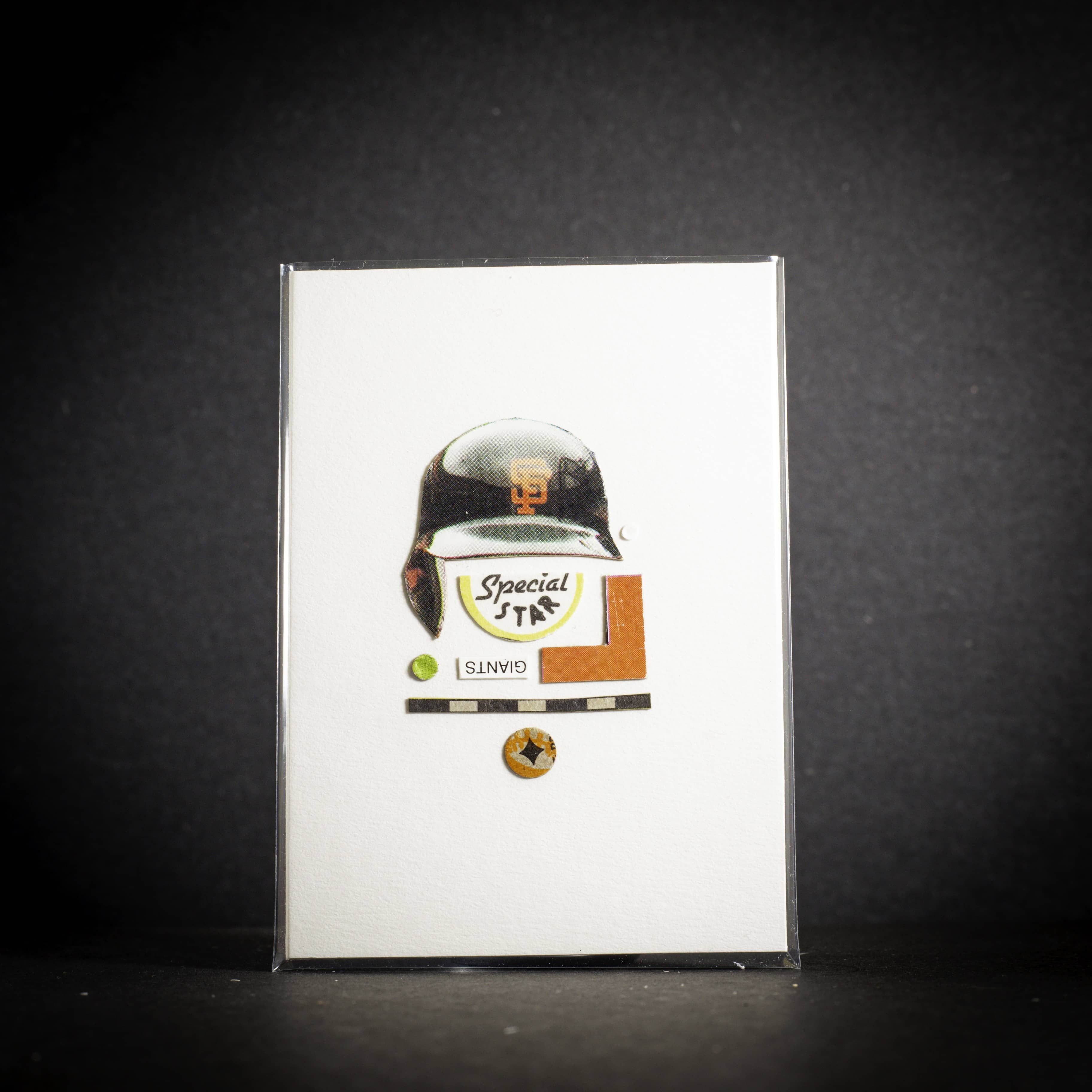 Cassette tape with a label featuring a helmet and 'Special' text on a dark background