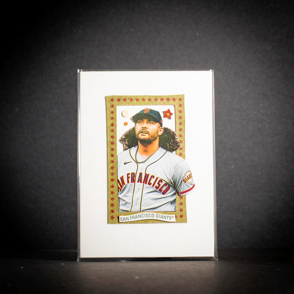 Baseball trading card of a player in a San Francisco Giants uniform on a dark background
