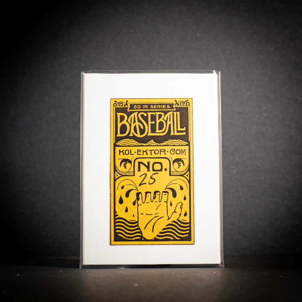 Baseball-themed collectible card in a clear protective sleeve on a dark background