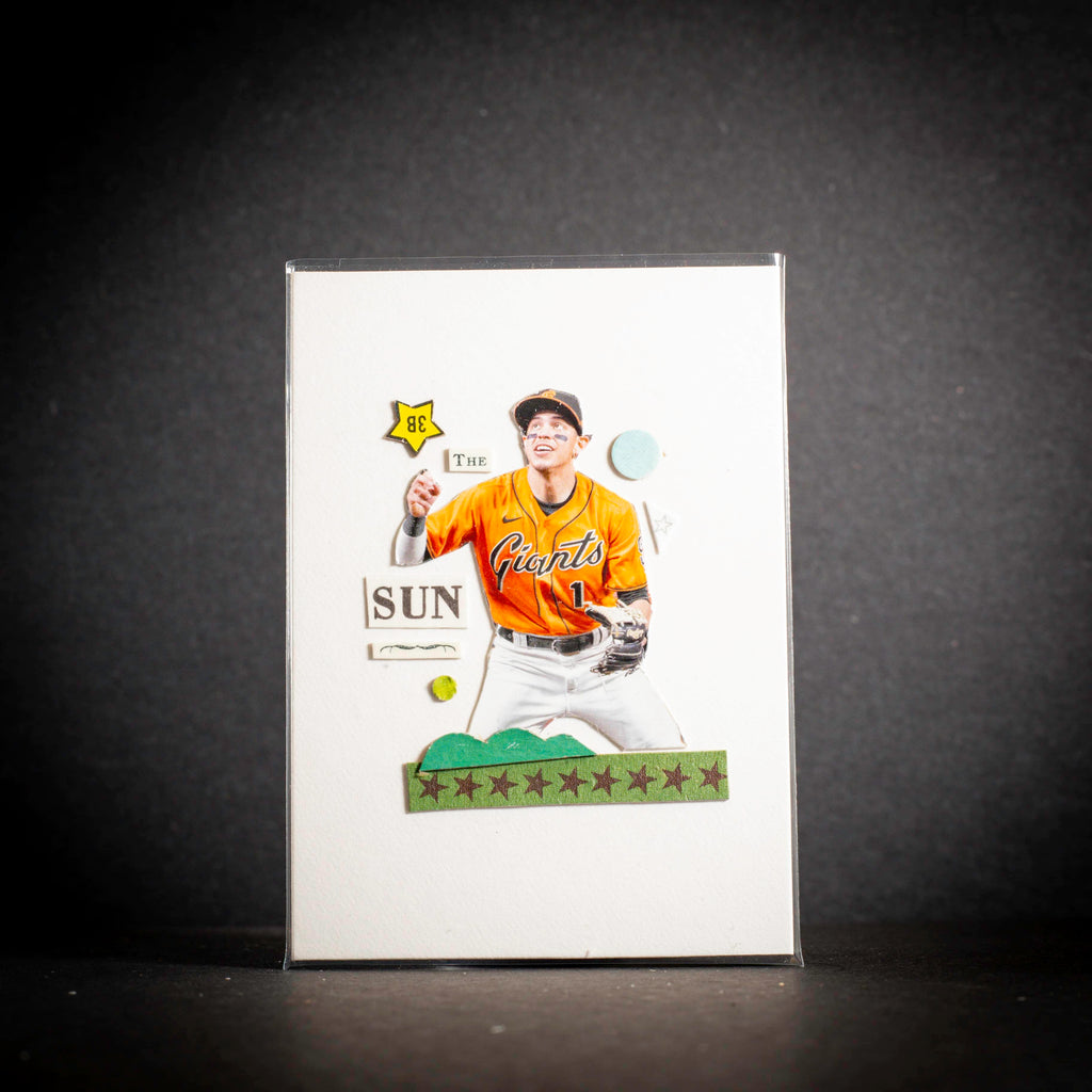 Baseball trading card of a player in a yellow jersey with 'Sun' and 'Giants' text on a dark background