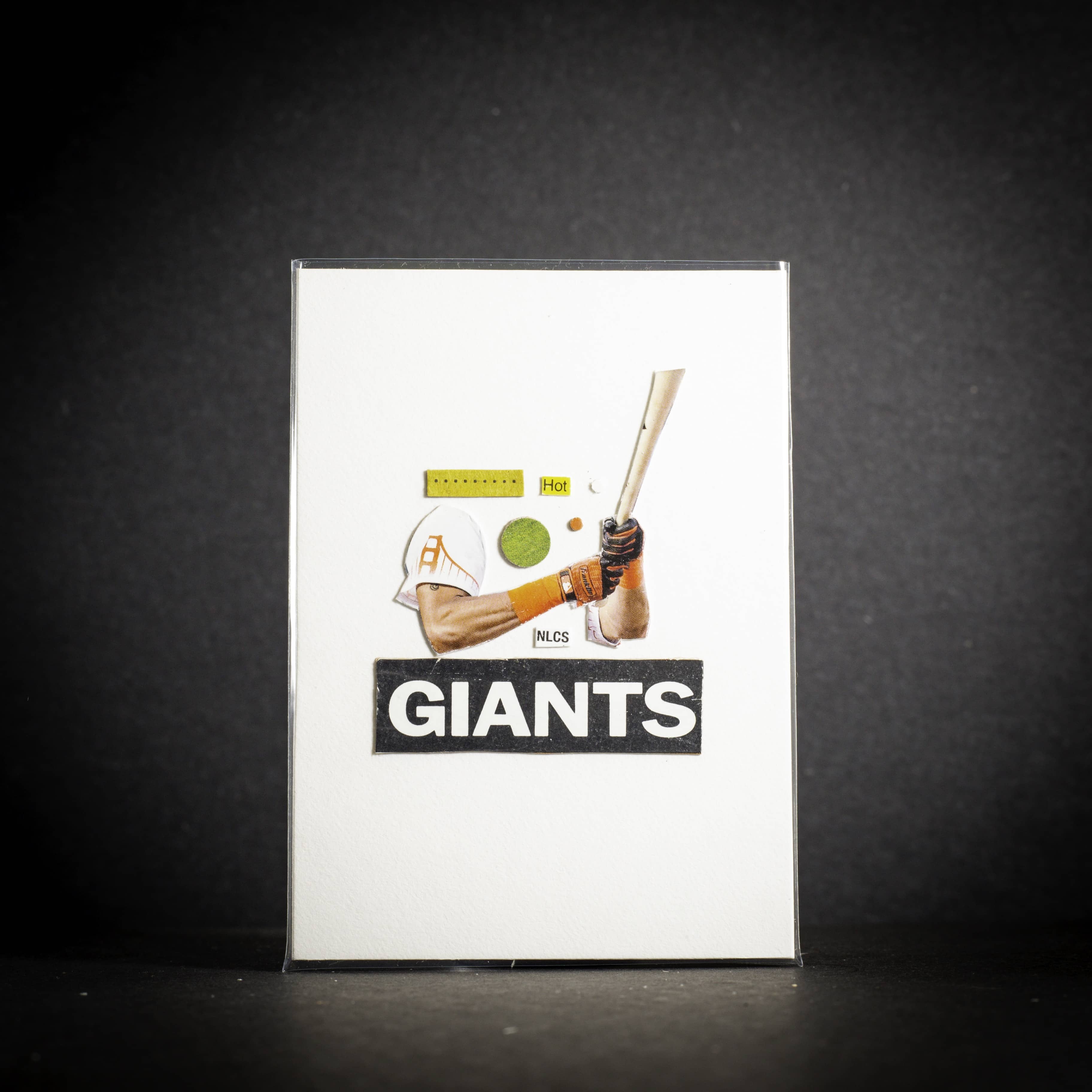 Product packaging with 'GIANTS' branding on a dark background