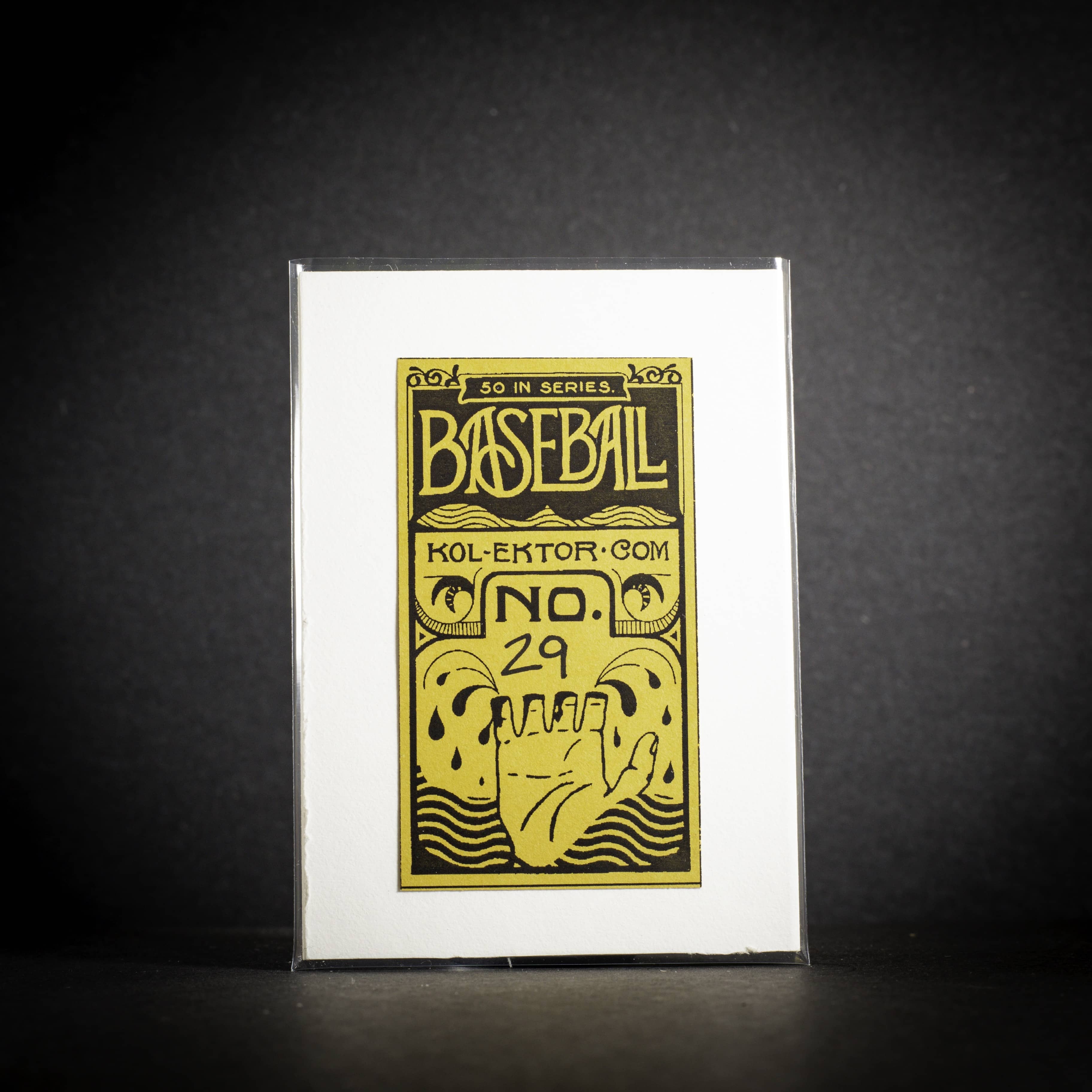 Baseball card packaging with yellow text and design on a black background