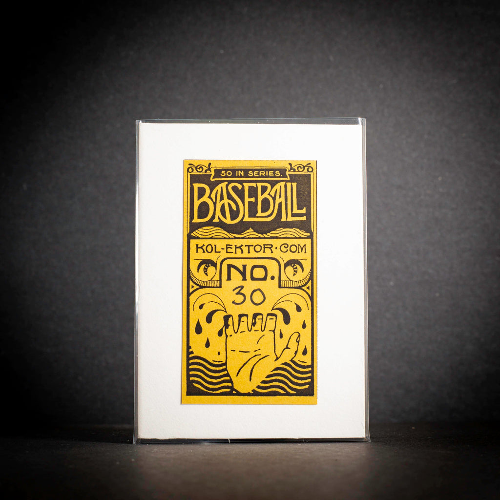 Baseball card packaging with yellow text and design on a black background