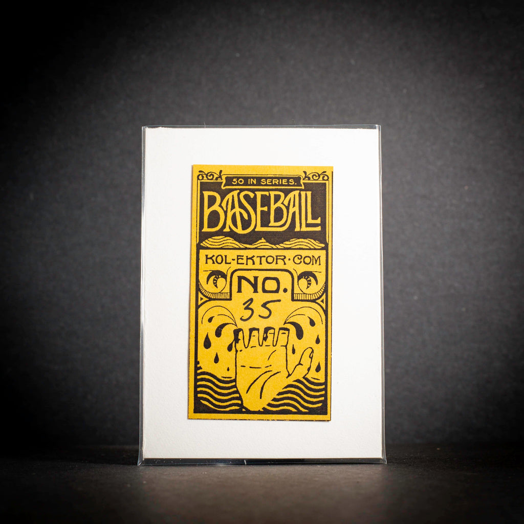 Baseball card packaging with yellow text and design on a black background
