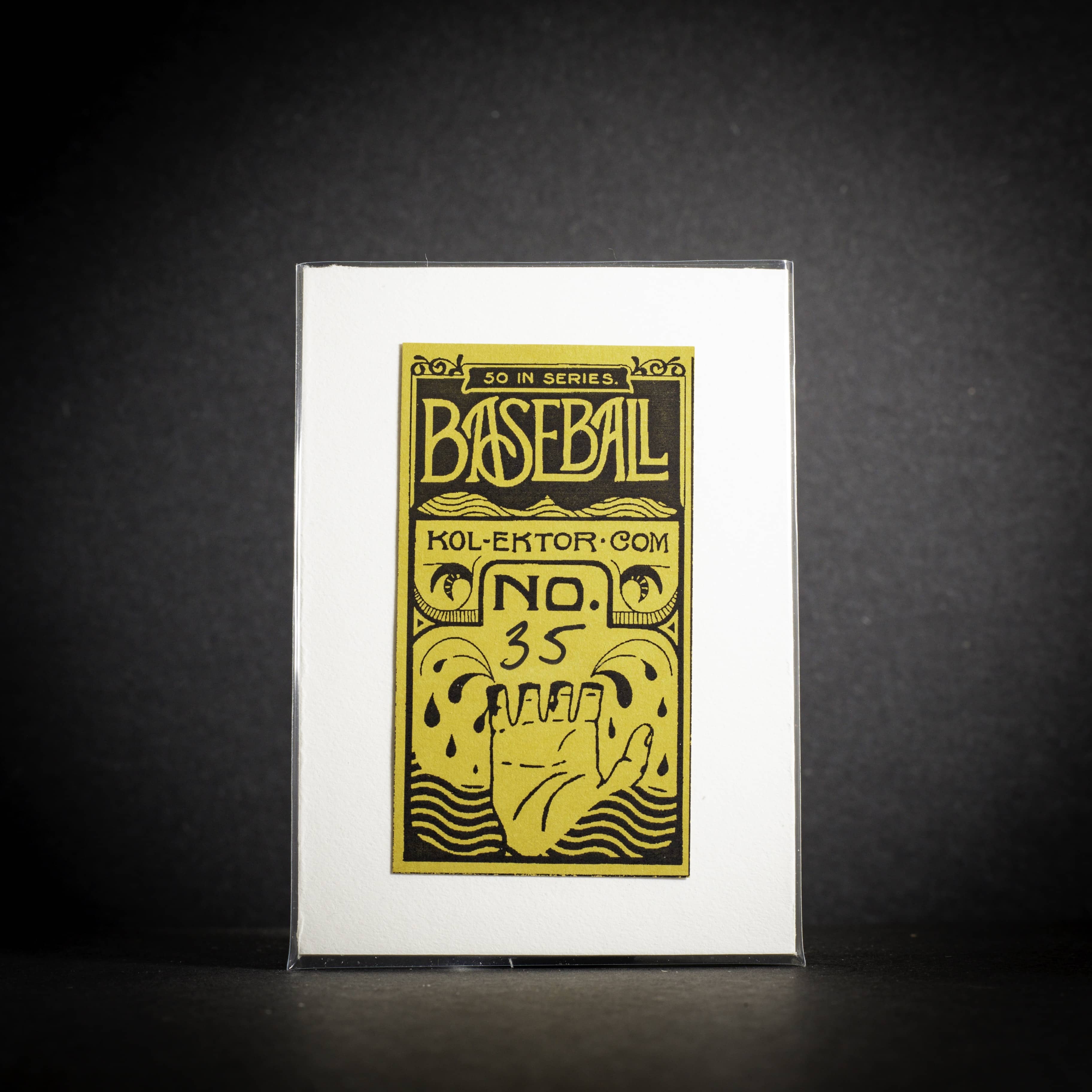 Baseball card packaging with yellow text and design on a black background