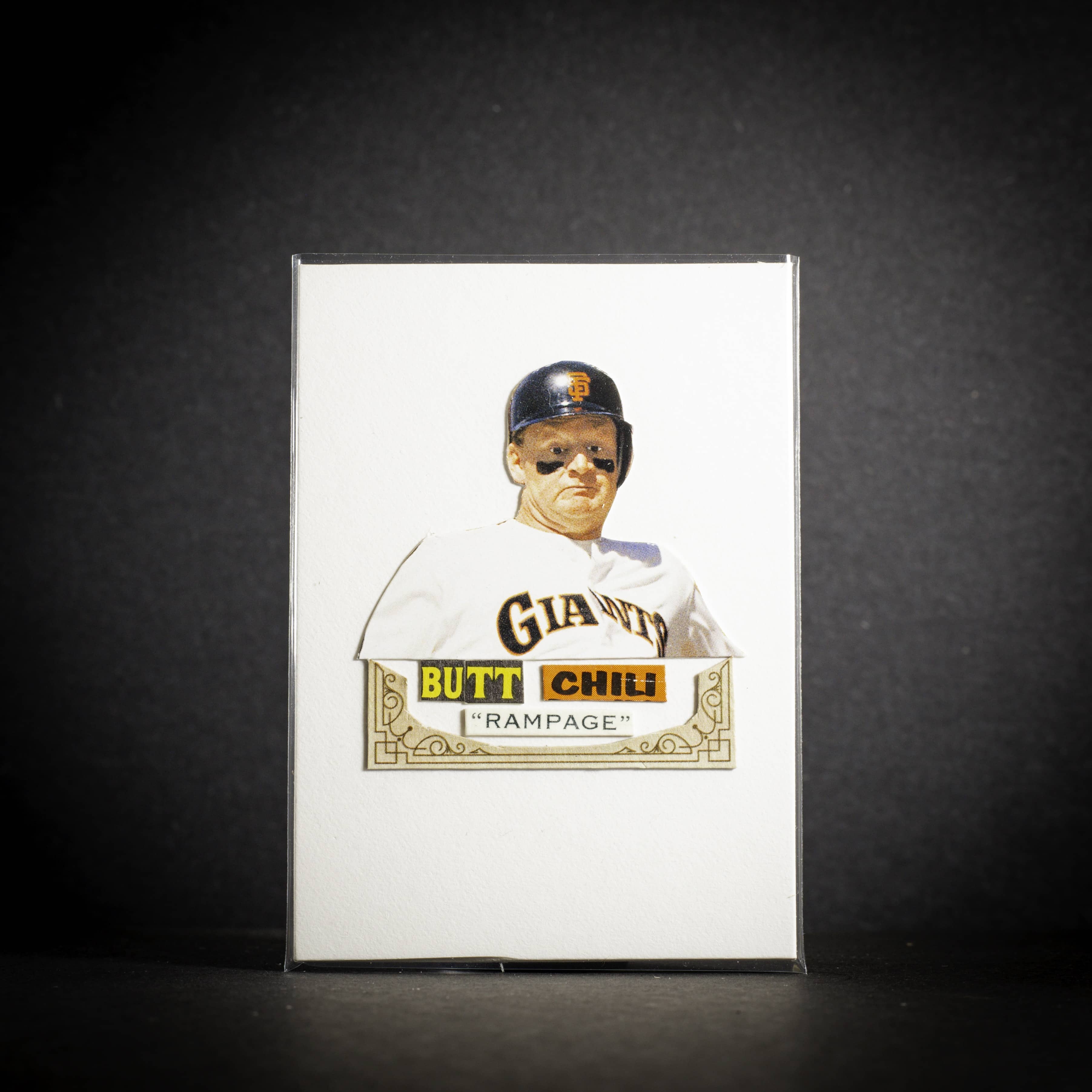 Card with a baseball player's face and 'Giants' logo on a dark background