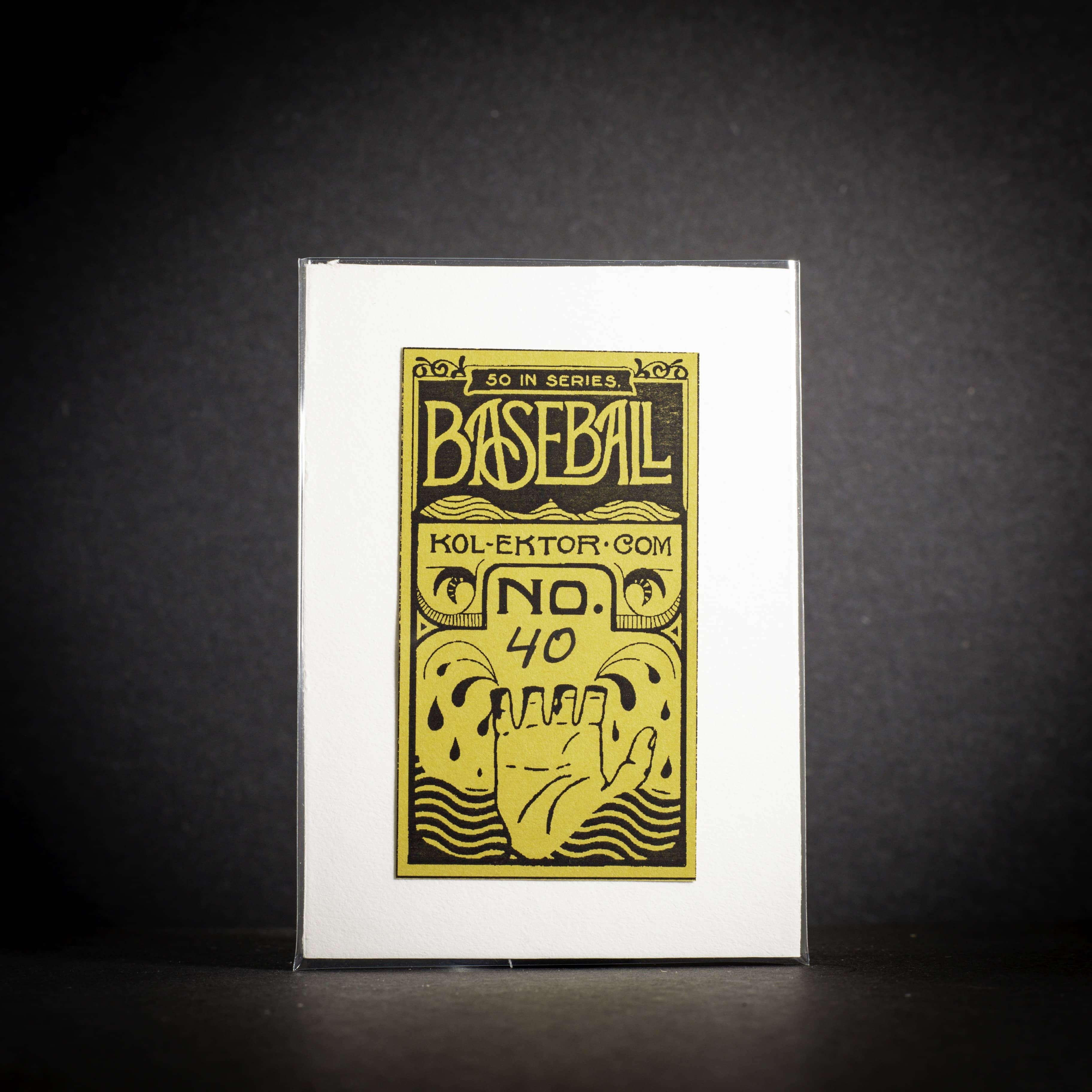 Baseball trading card in a protective sleeve on a dark background