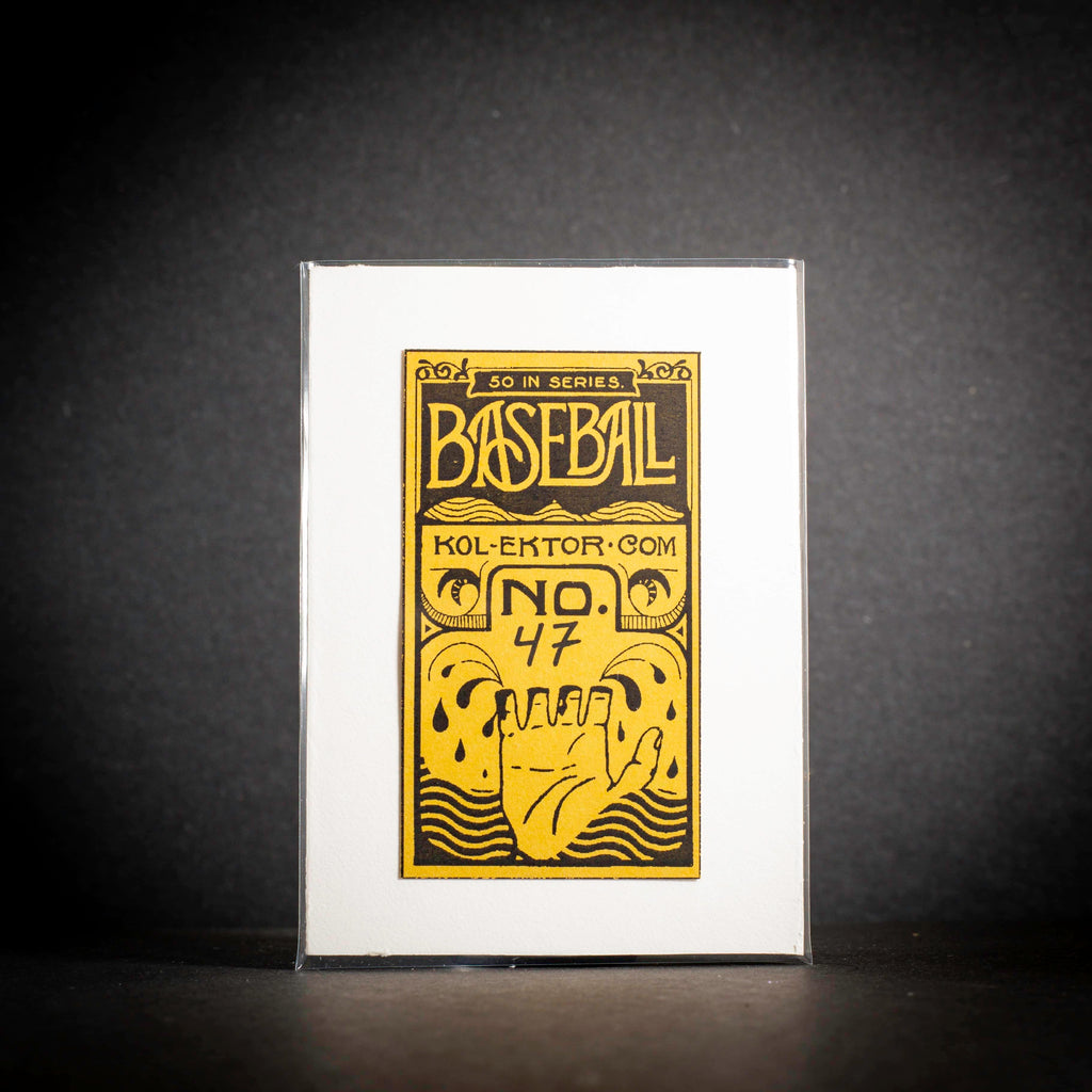 Baseball card packaging with yellow text and design on a black background