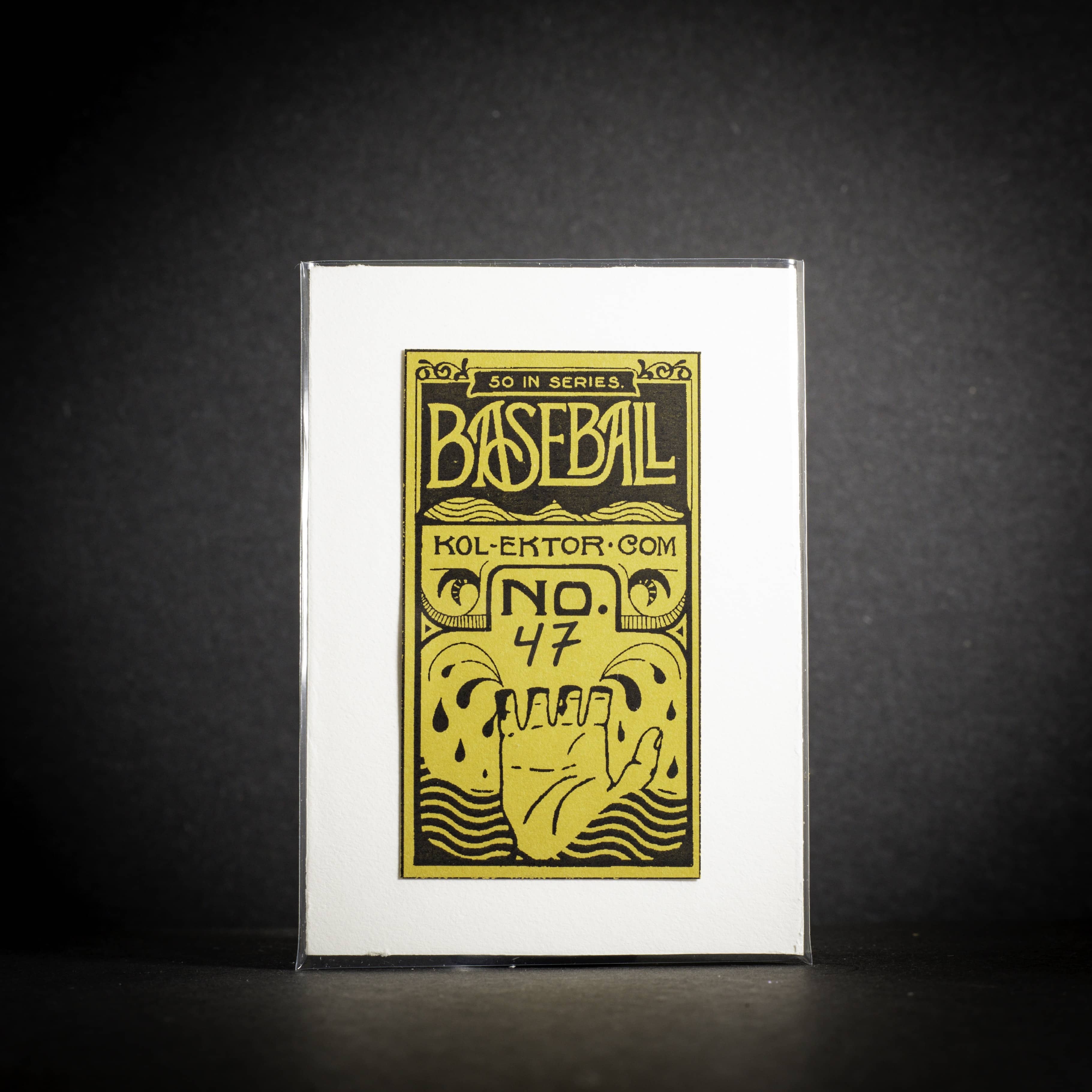 Baseball card packaging with yellow text and design on a black background